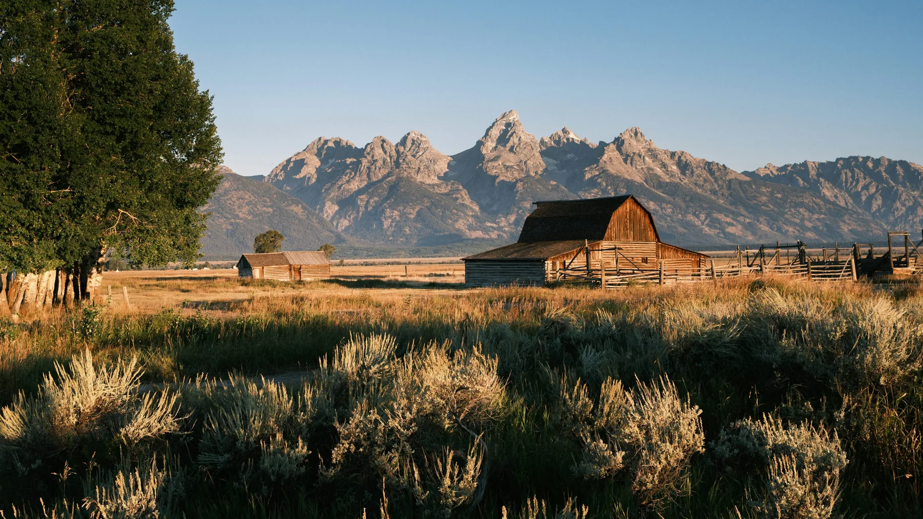 Historic barn beneath the Grand Teton mountains in Wyoming