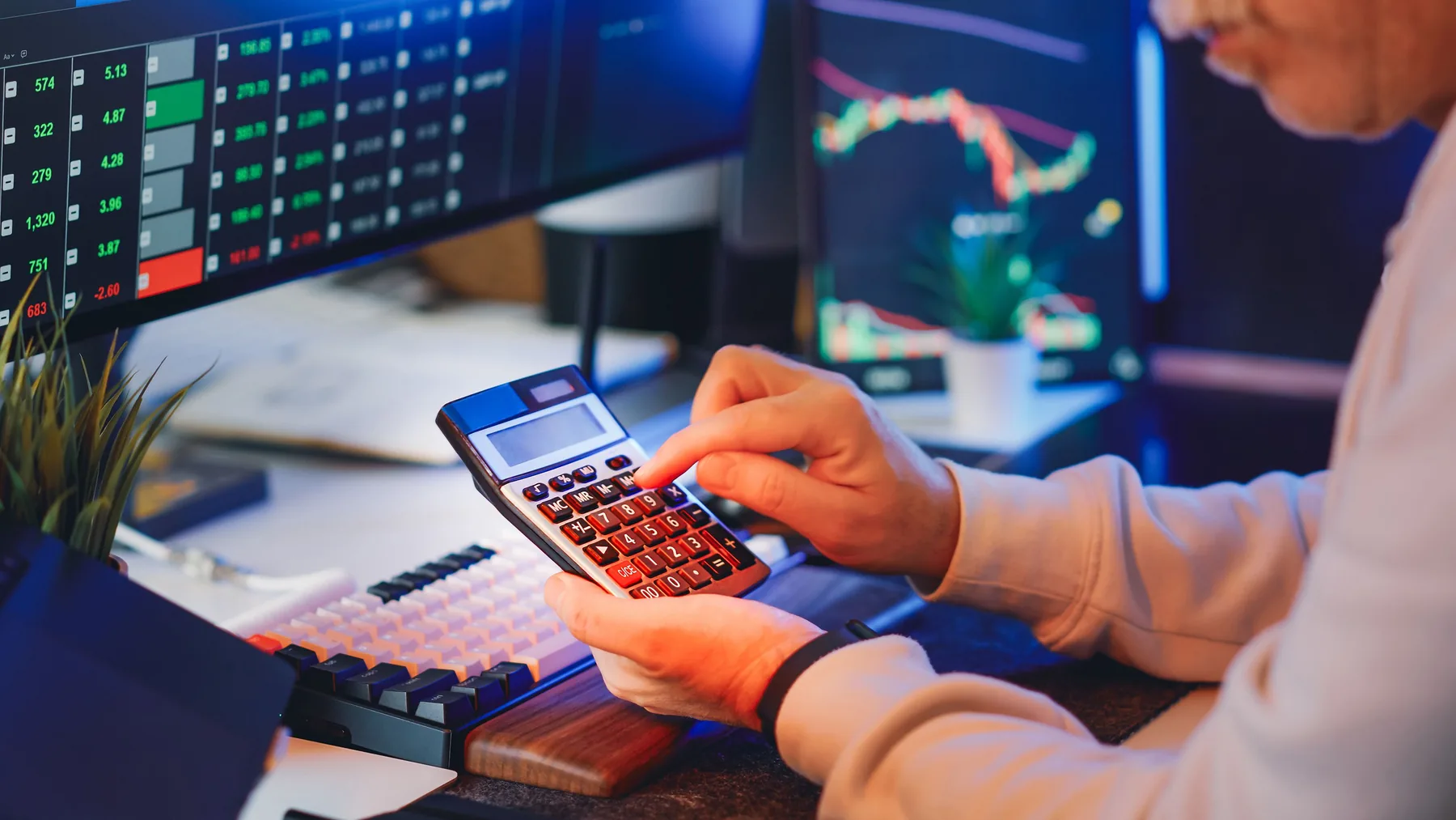 Analyst viewing abstract market visuals in a quiet office